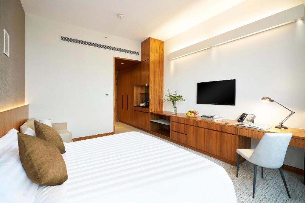 Hotel Cozi-Wetland Гонконг Экстерьер фото